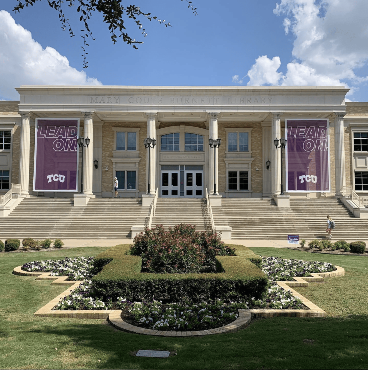 Students walk the steps of the Mary Couts Burnett Library. (Photo courtesy of @tculibrary on Instagram) 